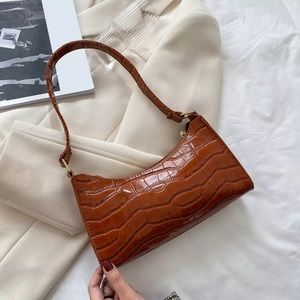Crocodile pattern leather handbag